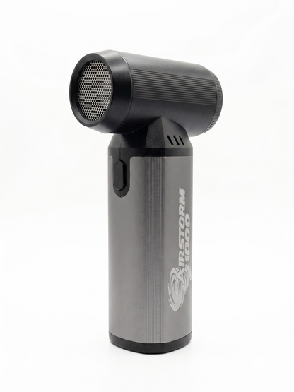 AirStorm 1000 standing upright, three-quarter view, showing its gunmetal aluminum body and black motor housing